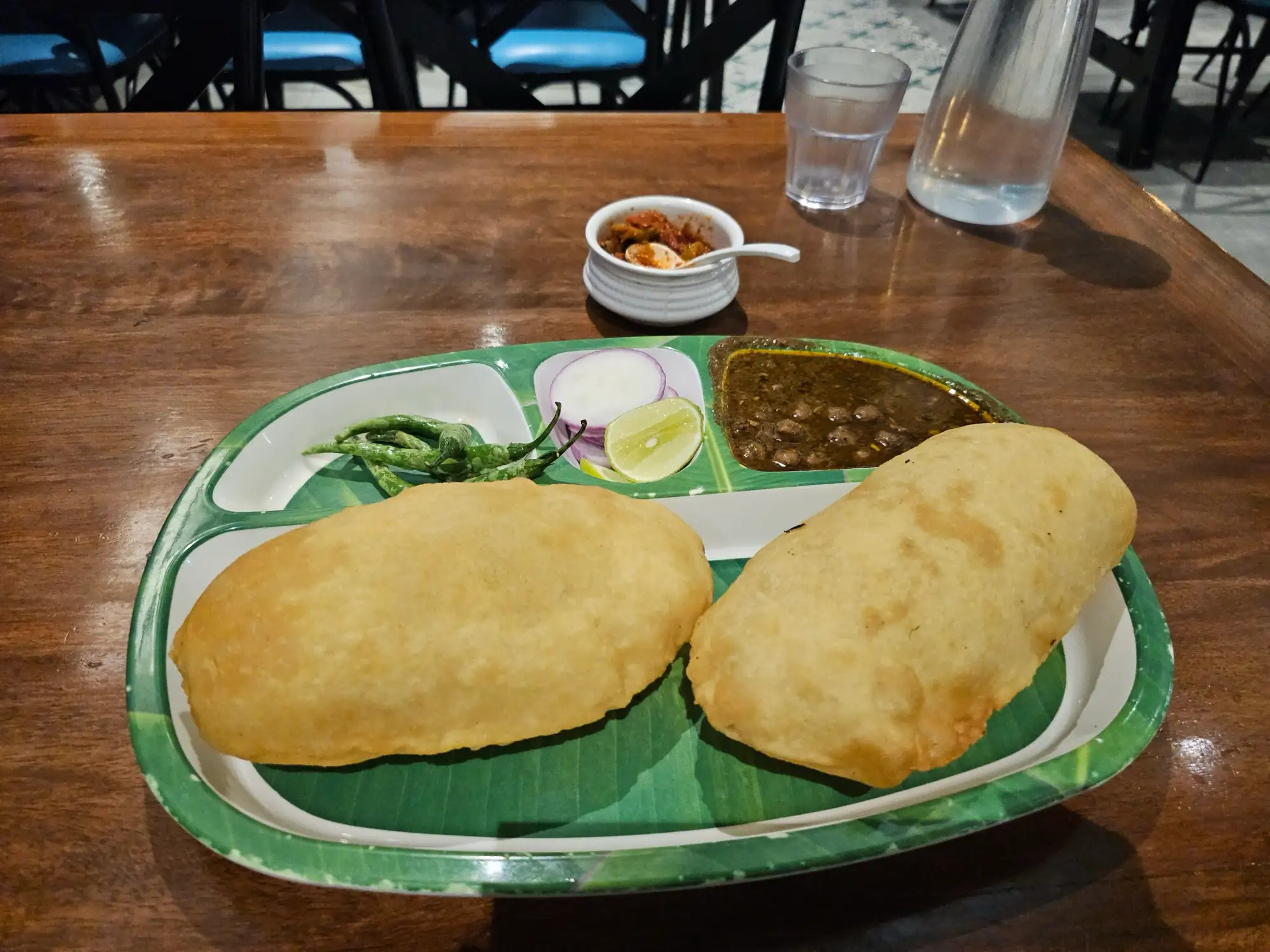 A plate of chole bhature: fried bread with chickpea curry