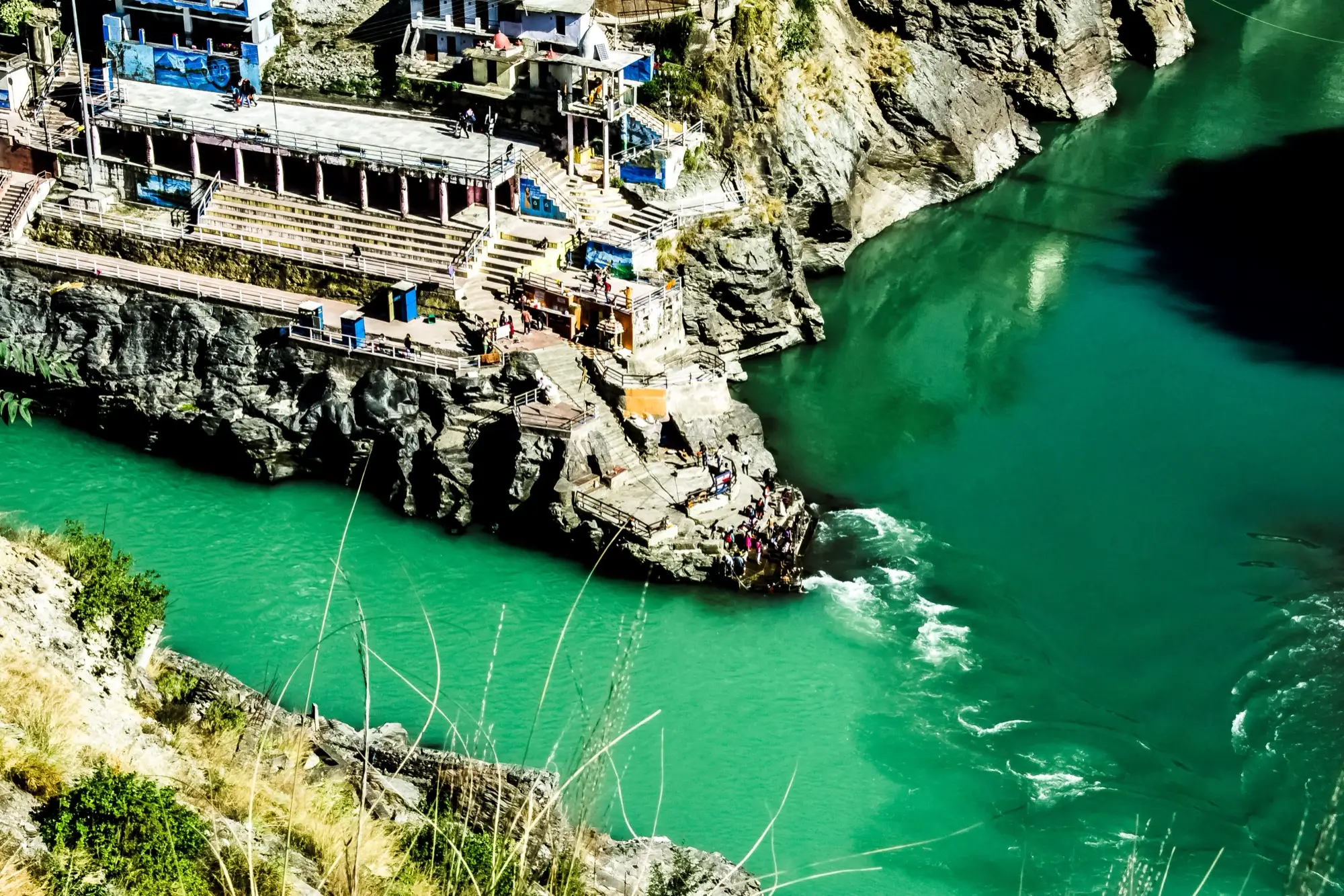 The Alaknanda and the Bhagirathi meeting at Devprayag, with the town on the spur between them