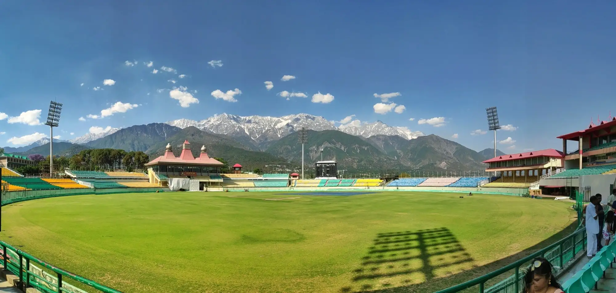The cricket stadium at Dharamshala, with the snow-covered Dhauladhar behind
