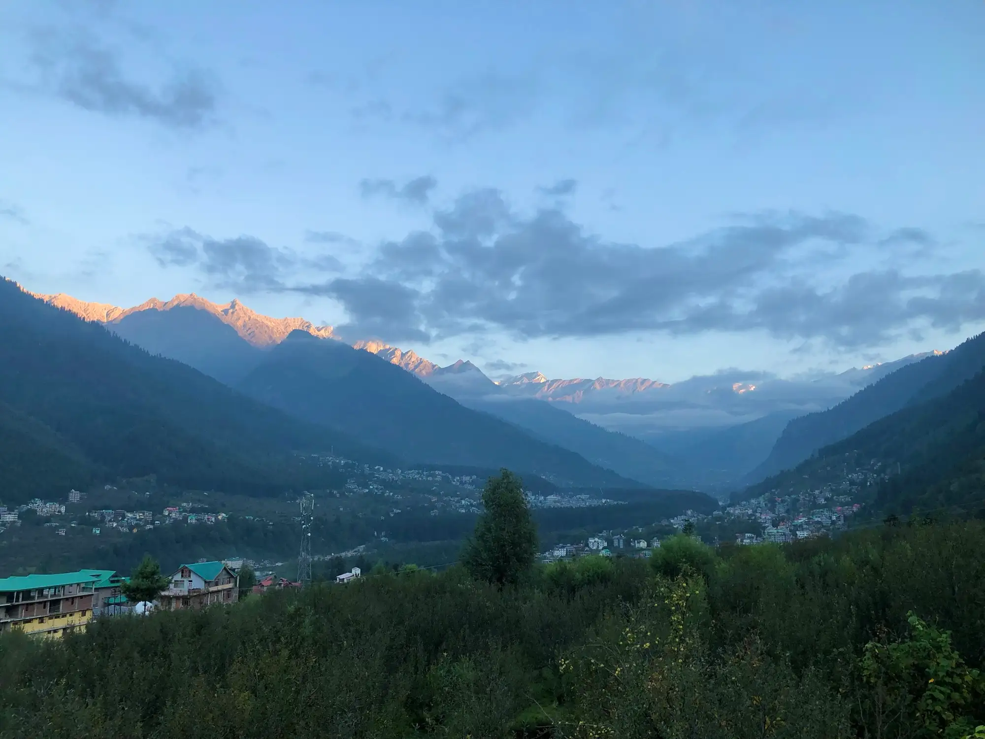 The Kullu valley at dawn from Prini village, with Manali town below