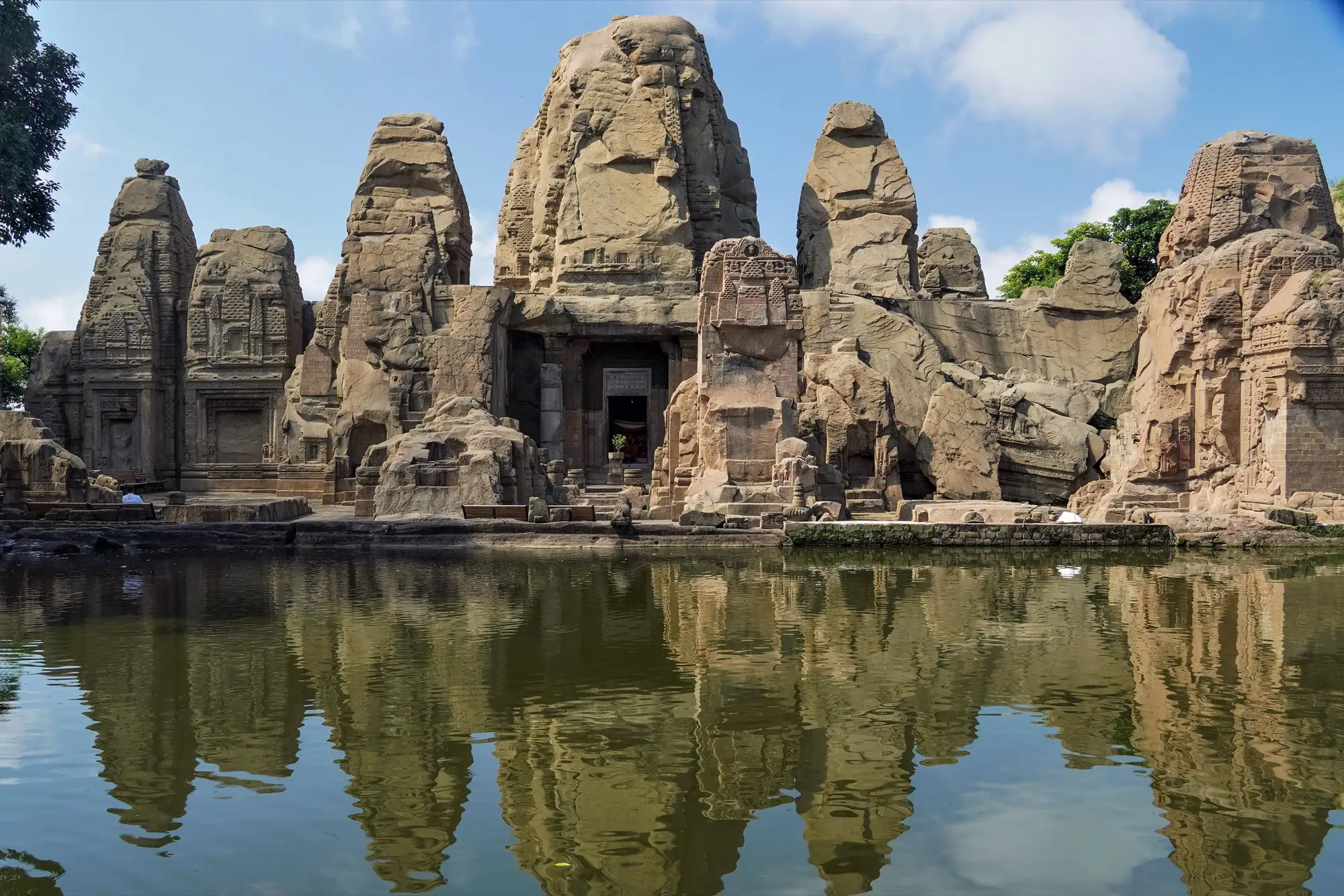 The Masroor rock-cut temples reflected in their pool