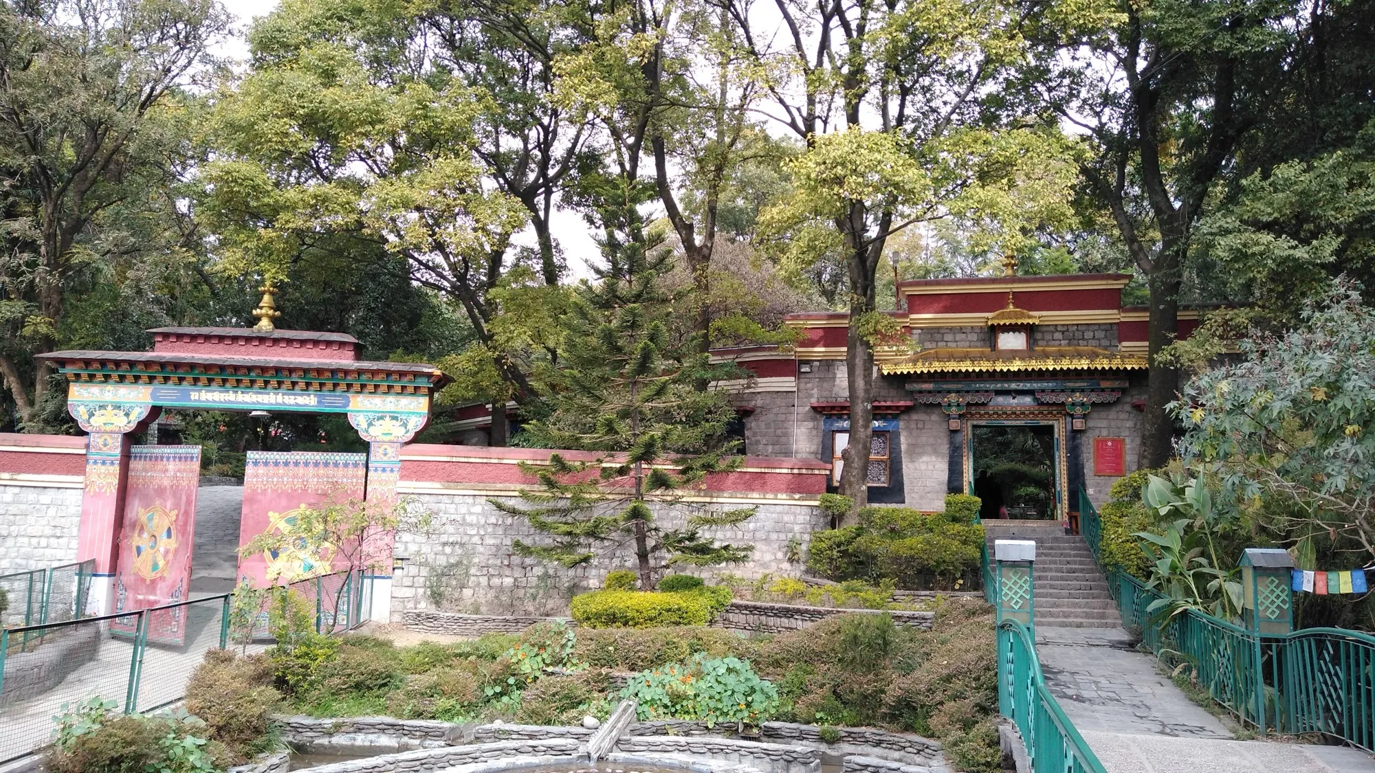 A Tibetan-style gateway and garden at the Norbulingka Institute