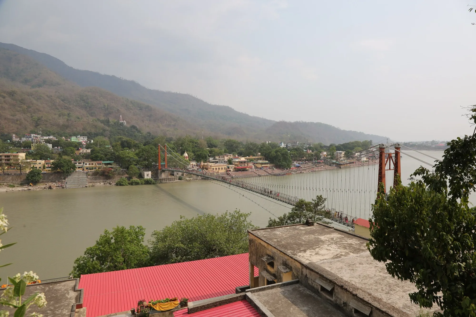 Ram Jhula footbridge over the Ganga, seen from the bank